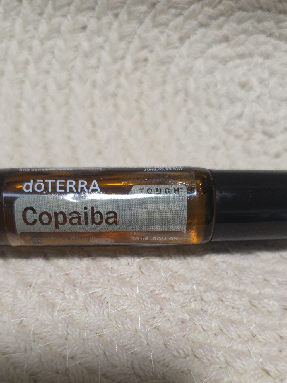 Doterra Copaiba Touch Roll-On - Amber Bottle with Black Cap